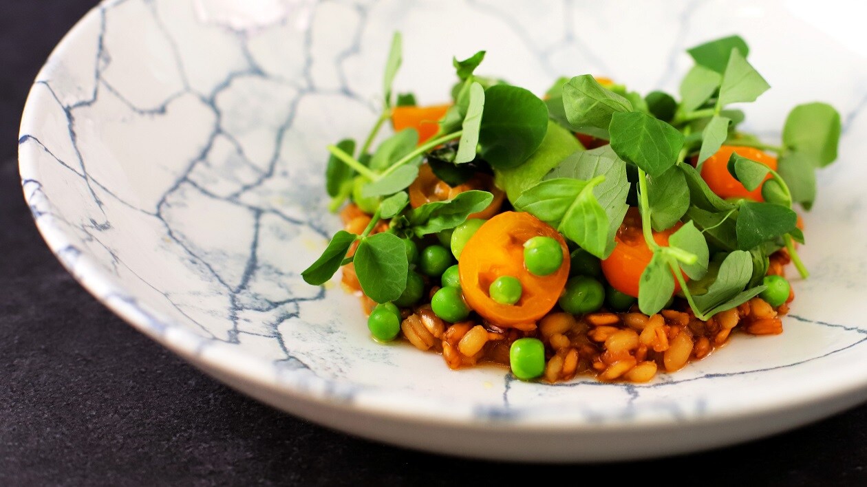 Risotto of orange tomatoes and spelt, peas and broad beans Recipe